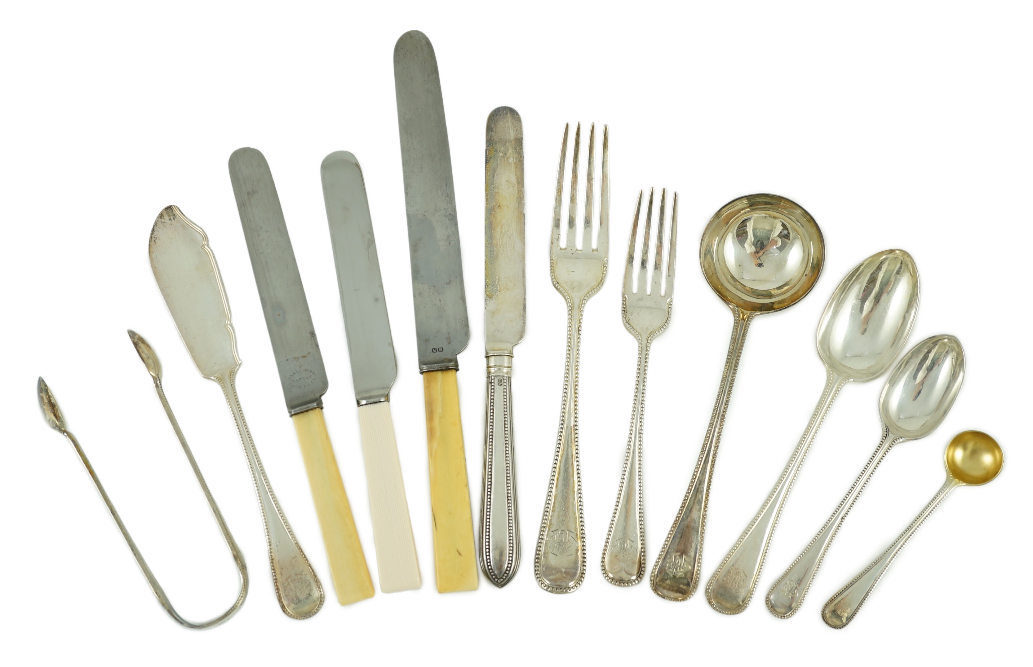 A Victorian part canteen of silver double struck Old English beaded pattern cutlery by George Adams